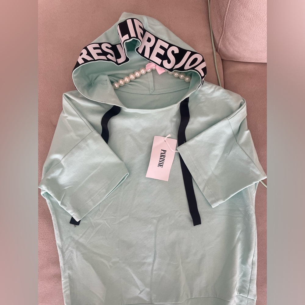 Shirt with hood , small/medium size . Never used